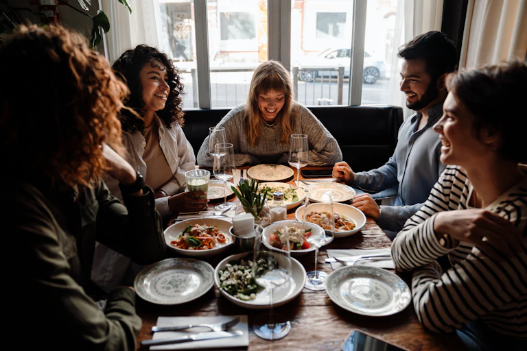 A group of friends having dinner