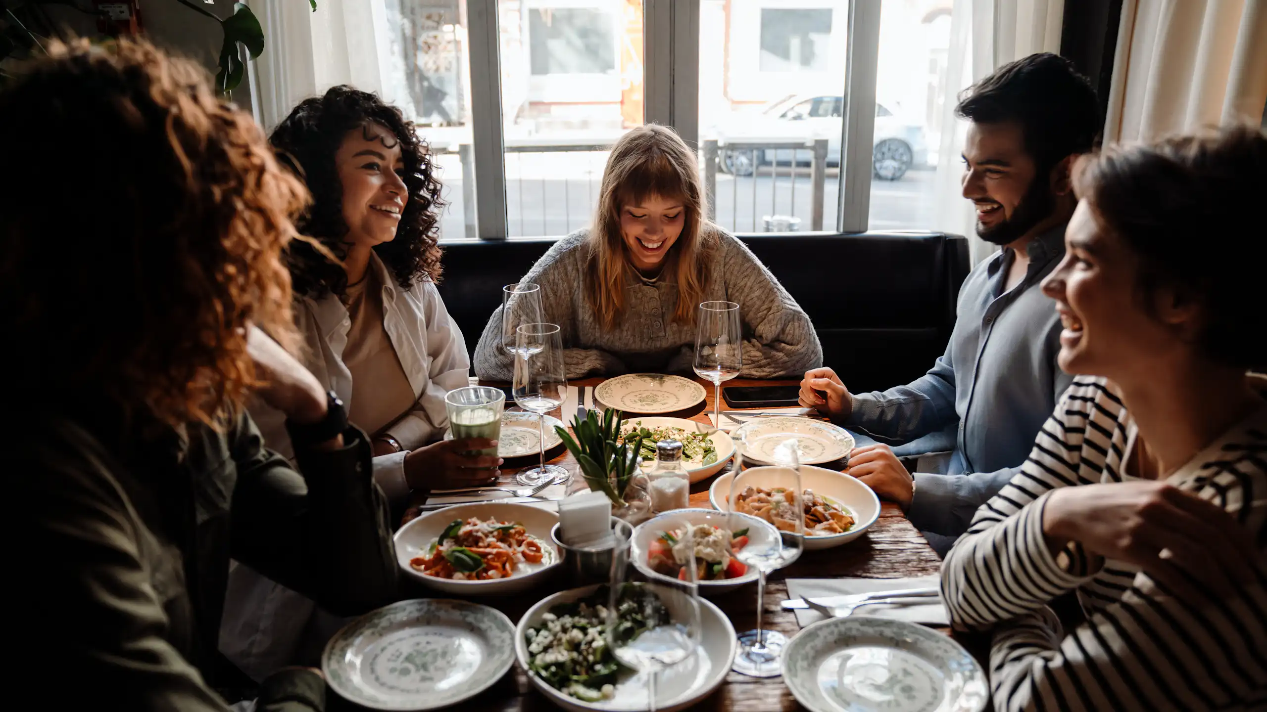 A group of friends having dinner