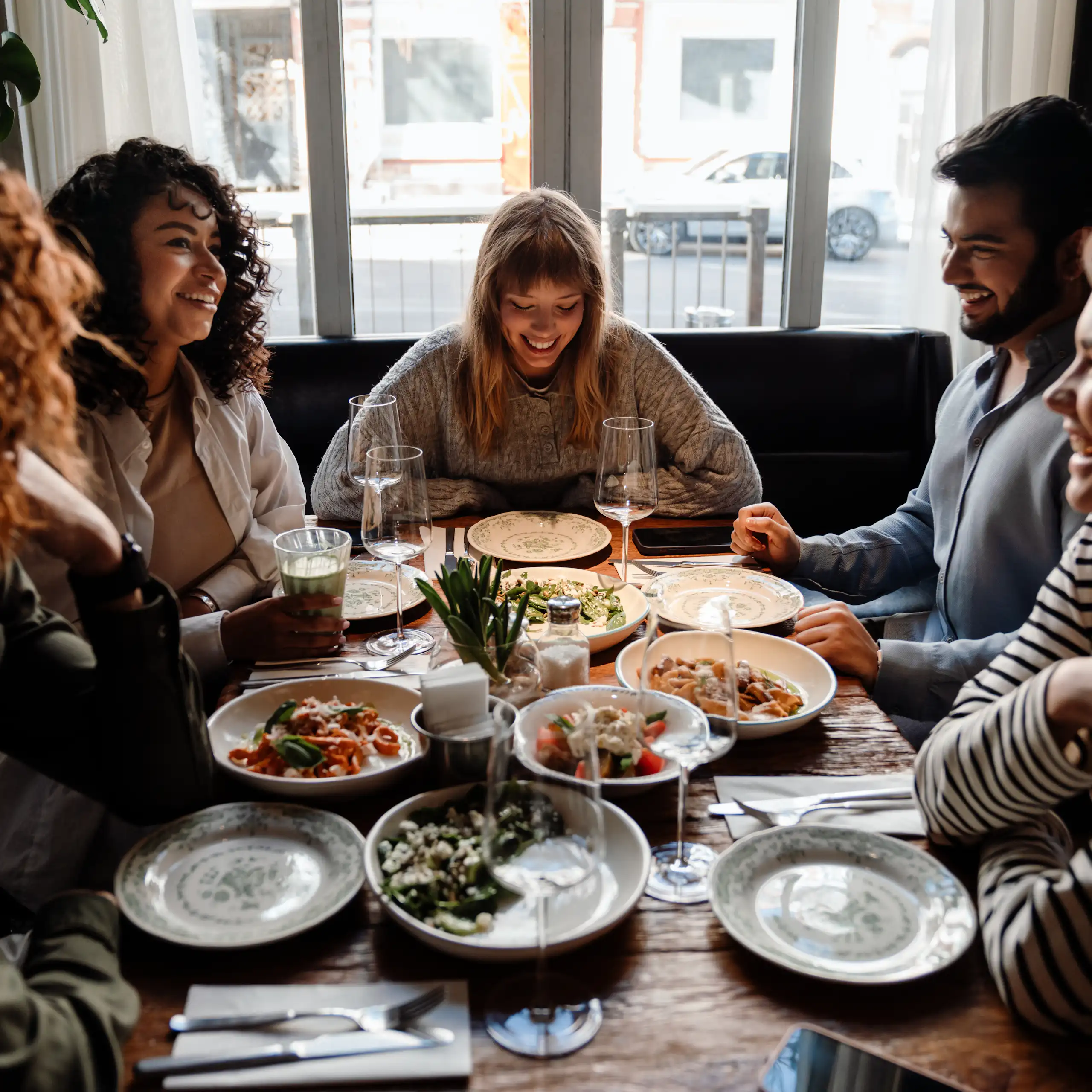 A group of friends having dinner