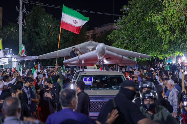A drones mounted on top of a car ikn the streets of Tehran at a state-sponsored rally, June 15 2026.