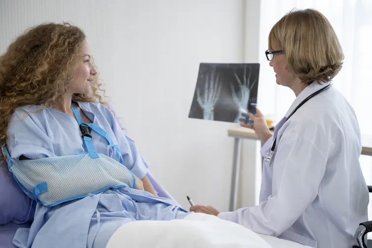 woman talking to doctor about X-rays