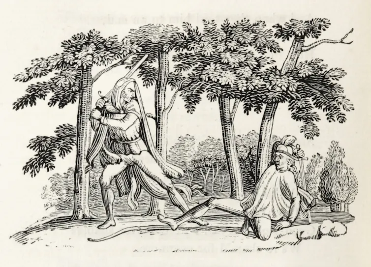 Robin Hood raising a sword over a person on the ground