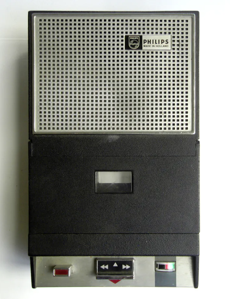 Image of an early compact cassette tape recorder.