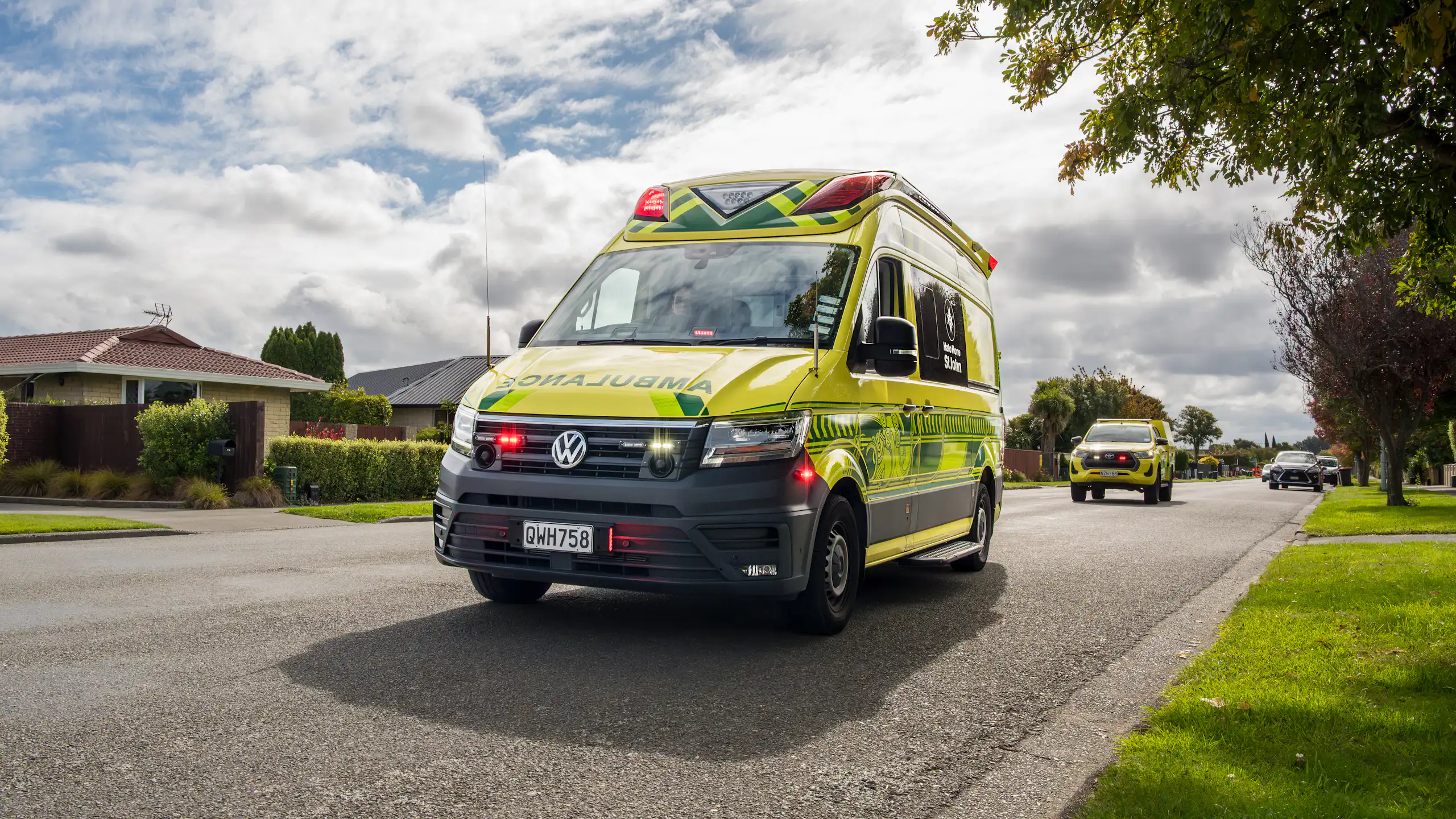 An ambulance parked in the road