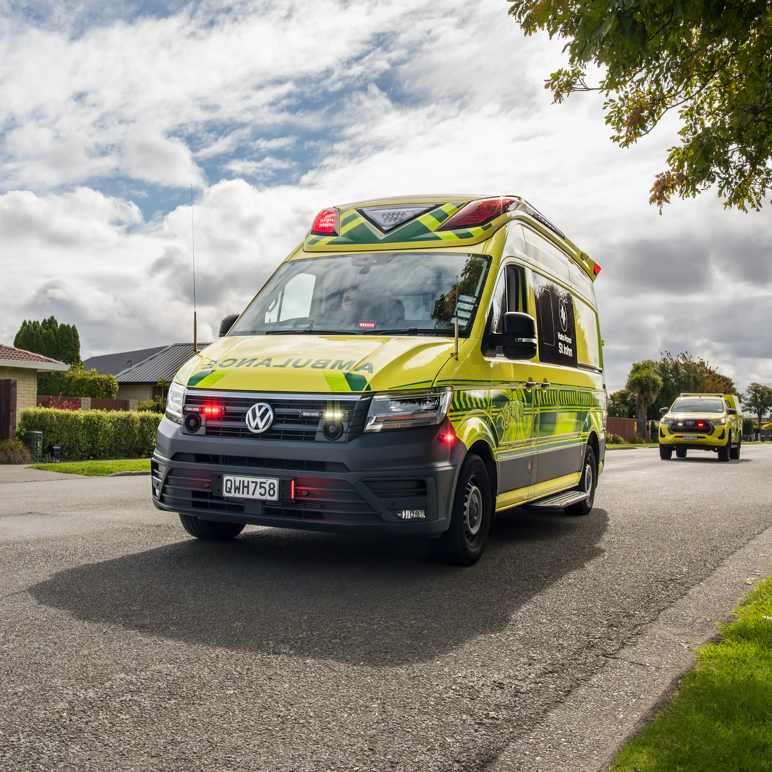 An ambulance parked in the road
