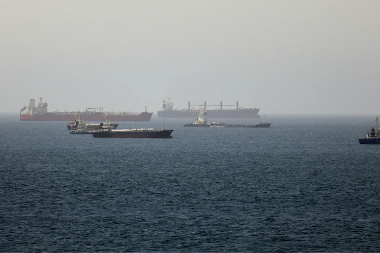 Tankers and cargo vessels are seen in the Gulf of Oman, along shipping routes linking the Strait of Hormuz.