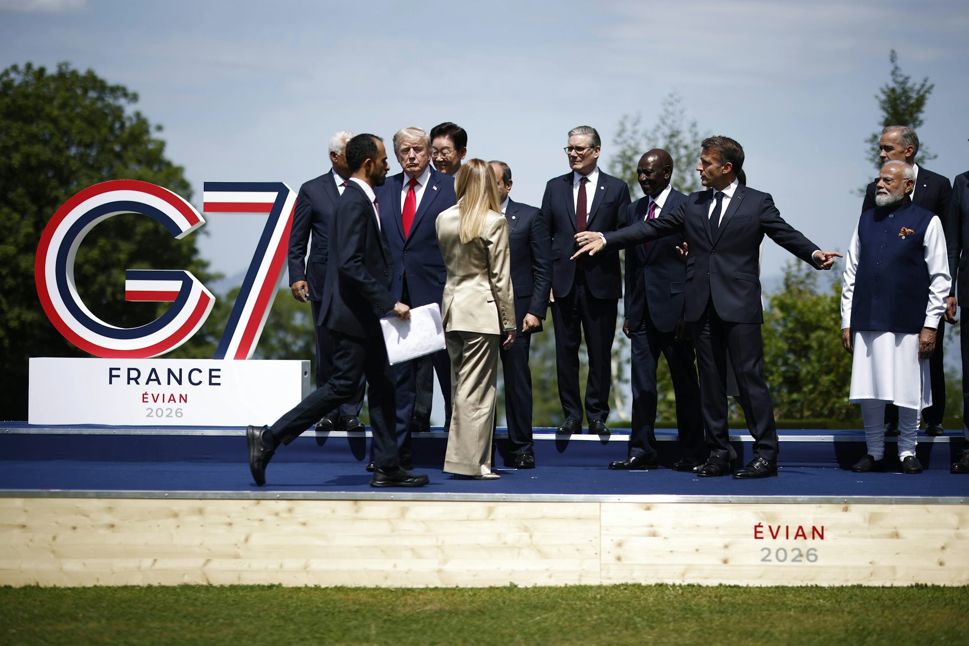 G7 leaders assemble for a 'family photo' during the 2026 summit in Evian-les-Bains, France.