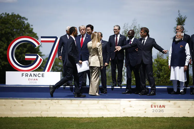 G7 leaders assemble for a 'family photo' during the 2026 summit in Evian-les-Bains, France.