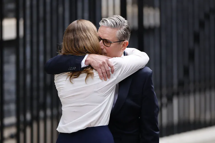 keir starmer hugs his wife victoria immediately after delivering his resignation speech.