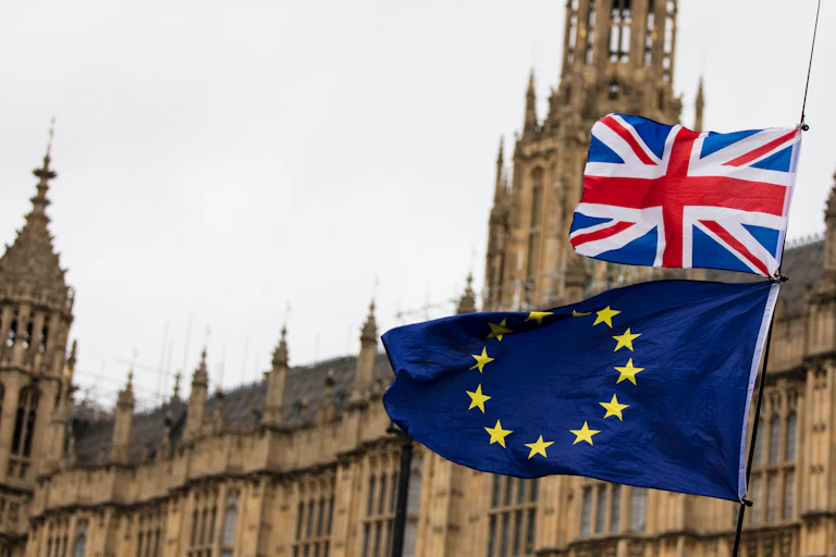 Britain and EU flags flying.