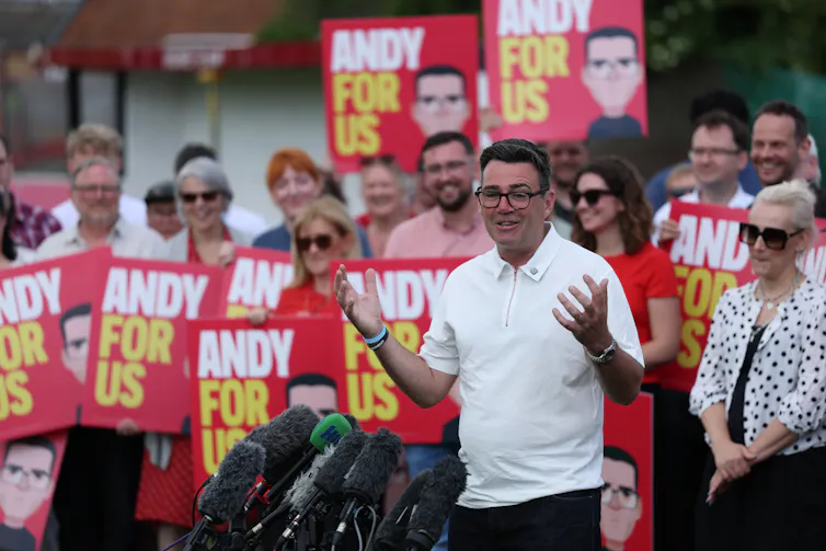 andy burnham with supporters shortly after his win in the makerfield byelection.