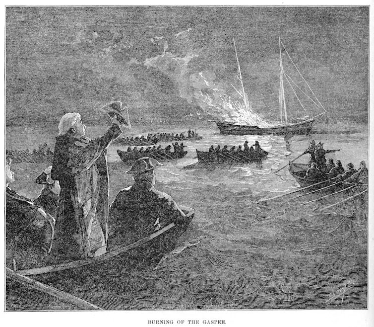 Colonists in boats set fire to a British ship