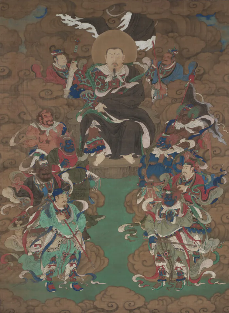 Desde los textos antiguos hasta las prácticas modernas, el taoísmo proporciona un marco profundo para entender el mundo no como algo roto, sino como una búsqueda natural del equilibrio. 3 Una imagen colorida de una deidad china sentada, rodeada de asistentes y otras figuras divinas.