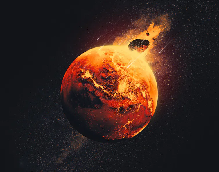 Descubrimos un nuevo tipo de roca que contiene granate dentro de un fragmento de meteorito marciano 3 Una imagen del planeta rojo, Marte, con un gran objeto lanzándose hacia él.