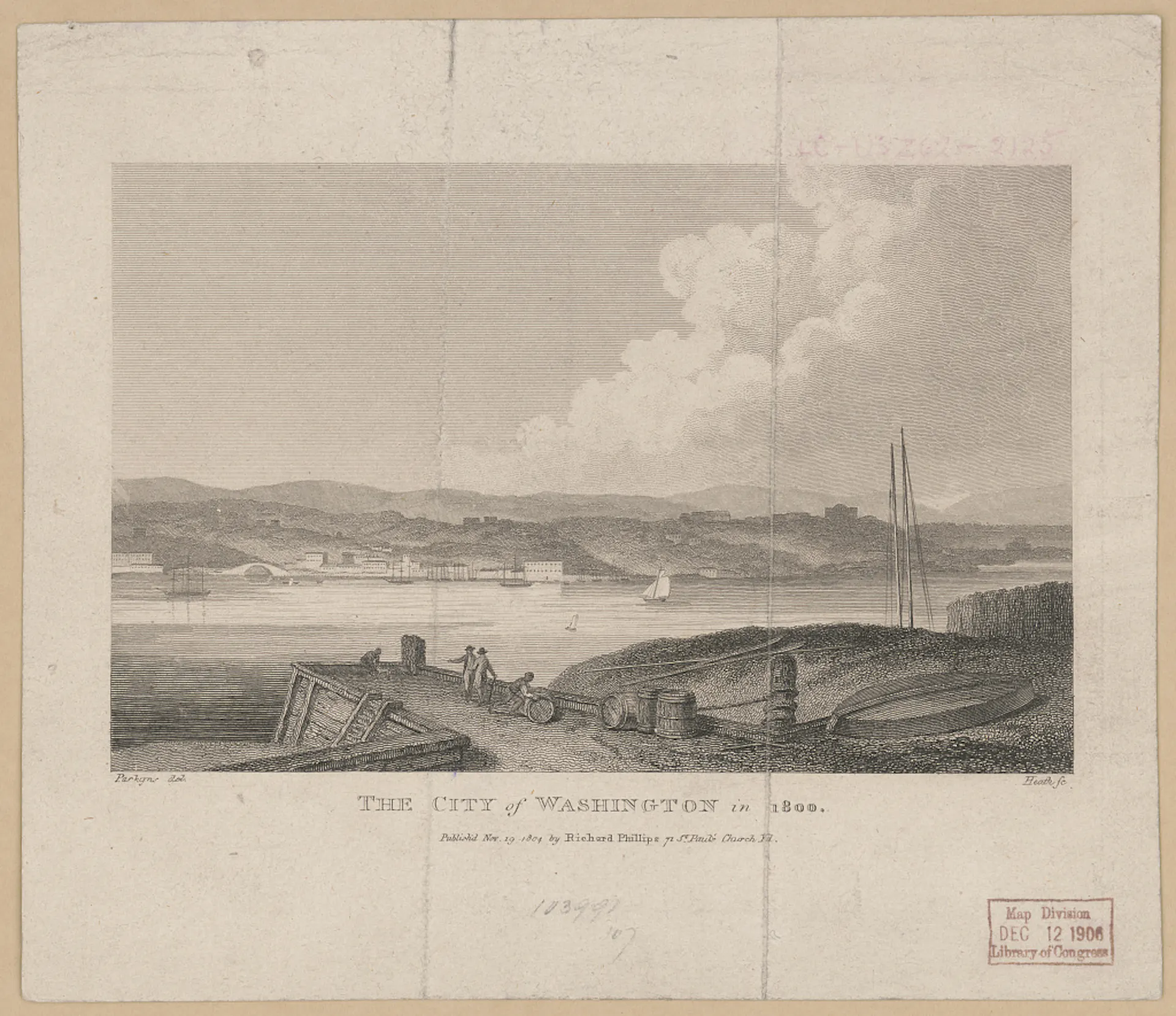 A view from across a river of a city, showing sparsely populated hills, an arched bridge, and some buildings along the waterfront with men and barrels in the foreground.