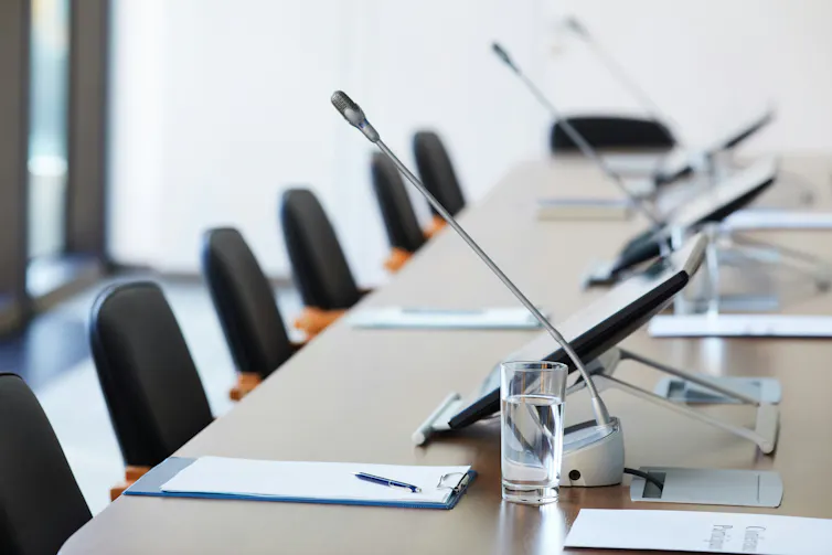 Empty seats in a boardroom