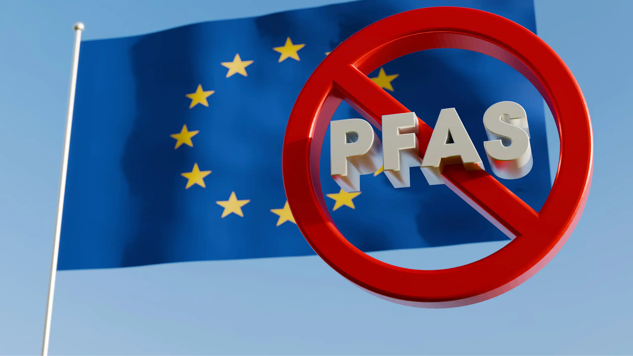 Drapeau de l'Union européenne surmonté d'un panneau d'interdiction où le terme PFAS est barré.