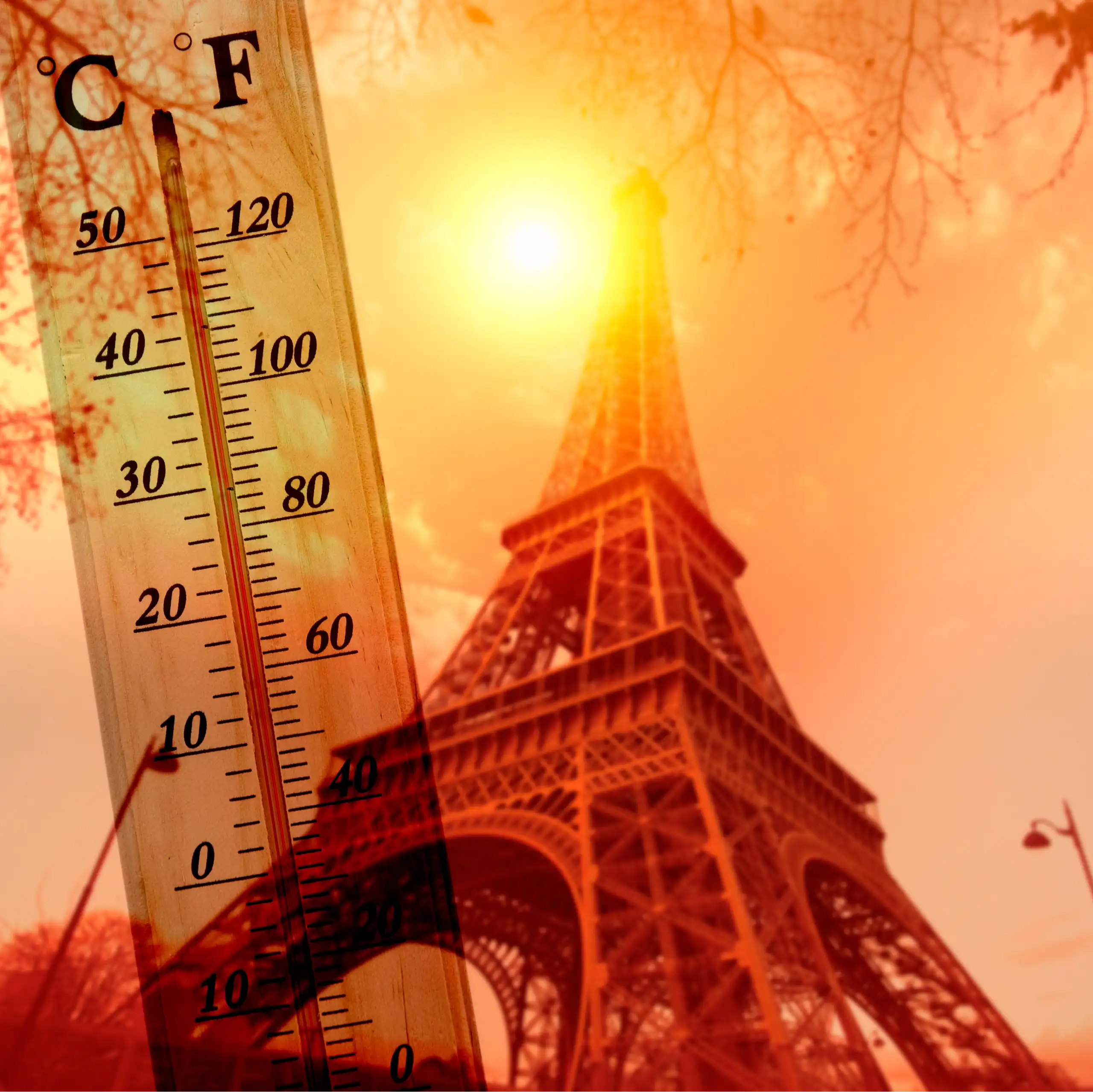 A picture of the Eiffel tower basking in the hot sun with a thermometer displaying a high temperature.