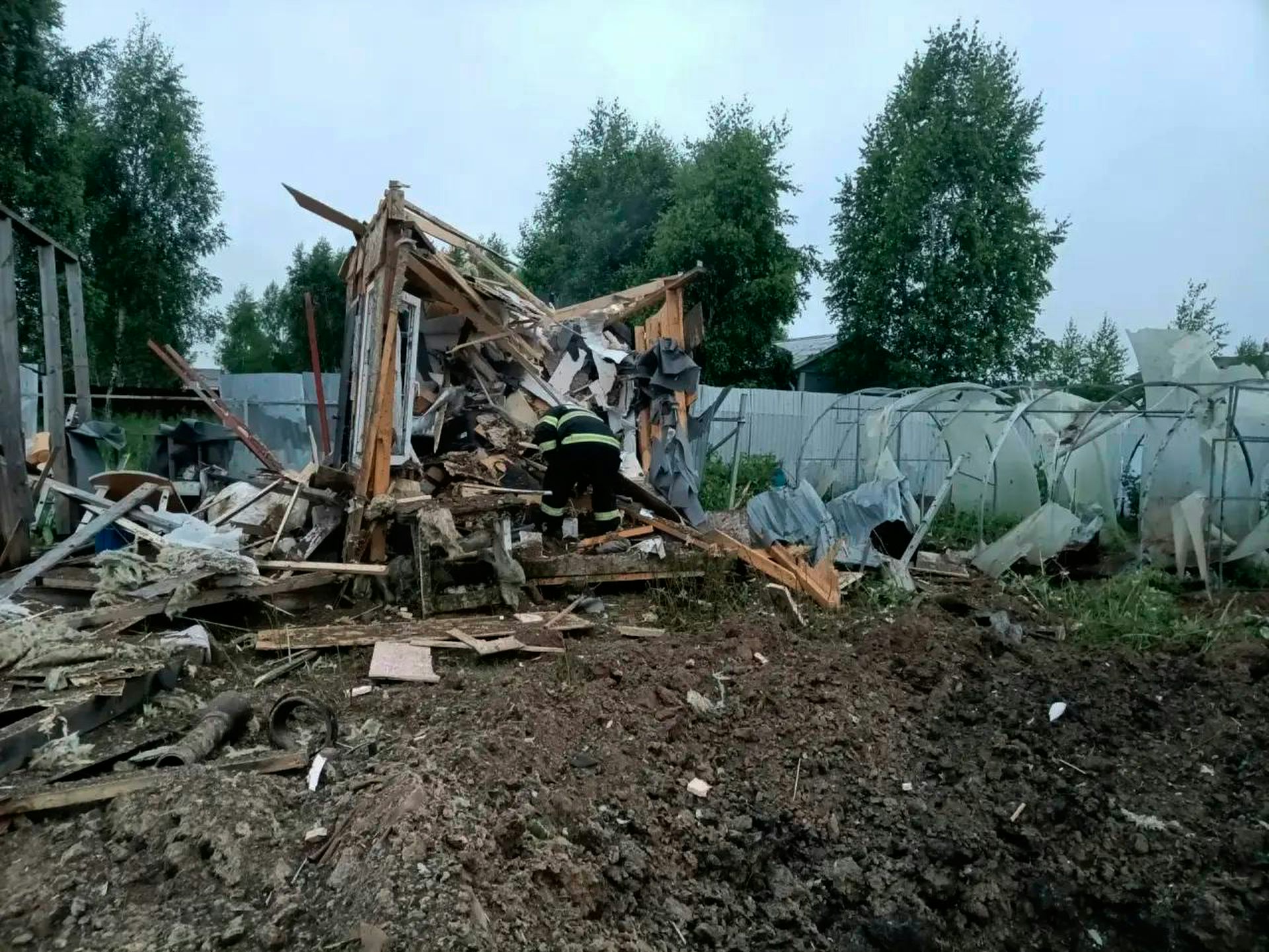 Rubble from a drone attack in a rural area.
