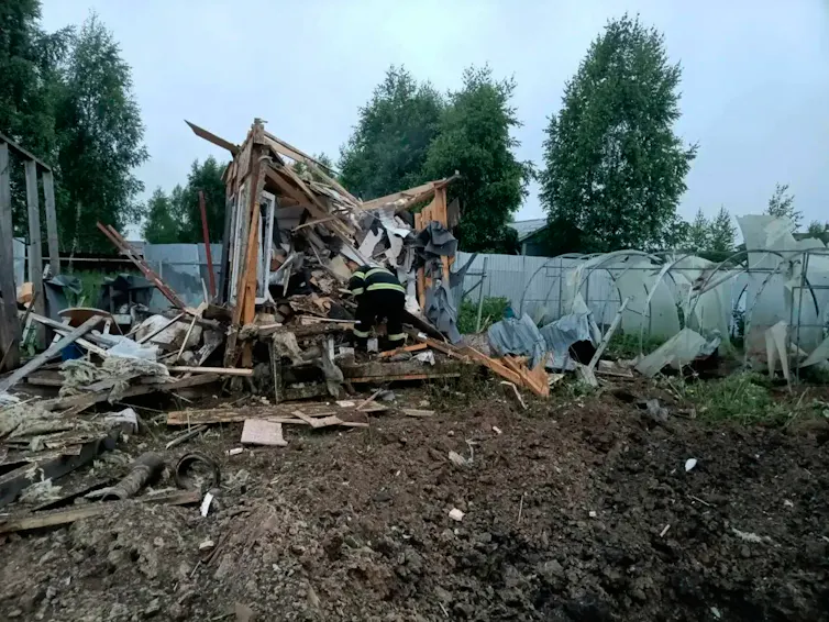 Rubble from a drone attack in a rural area.