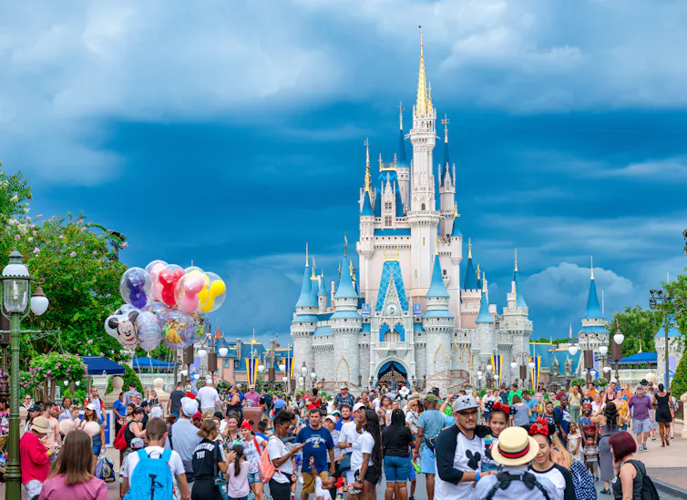 crowd outside Cinderella's castle at Disney World in Florida