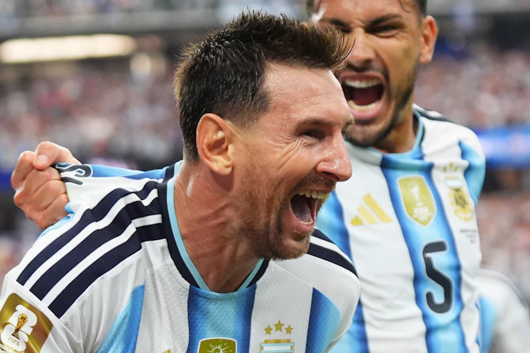 Lionel Messi of Argentina celebrates after scoring against Austria.