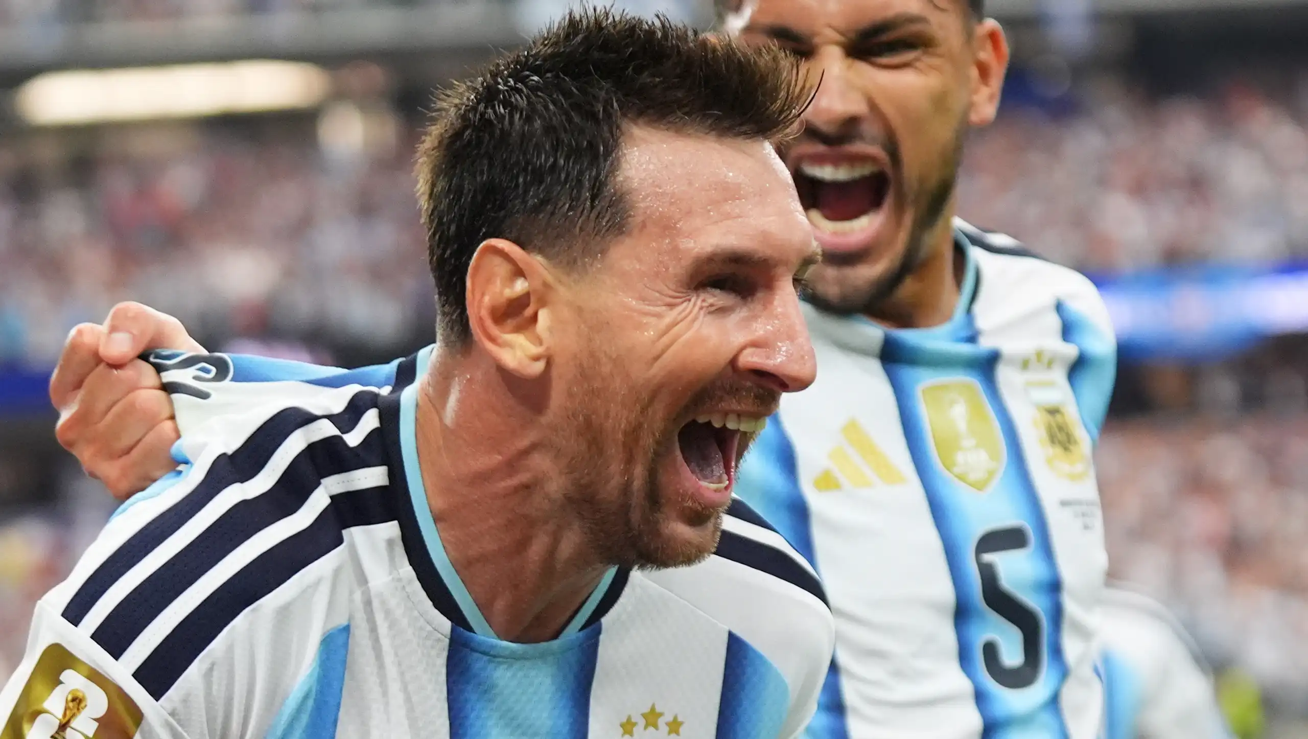 Lionel Messi of Argentina celebrates after scoring against Austria.