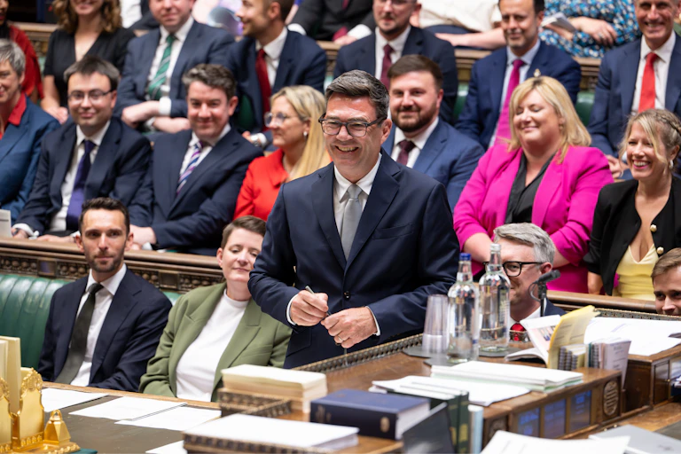 Andy Burham is sworn in as an MP in the UK parliament.