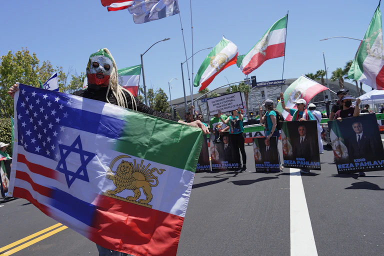 Protesters in Los Angeles gather ahead of an Iran vs. New Zealand World Cup game.