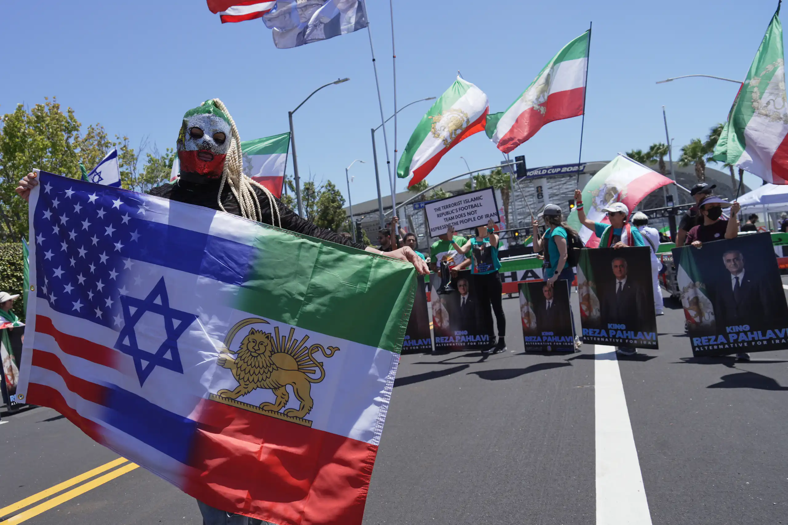 Protesters in Los Angeles gather ahead of an Iran vs. New Zealand World Cup game.