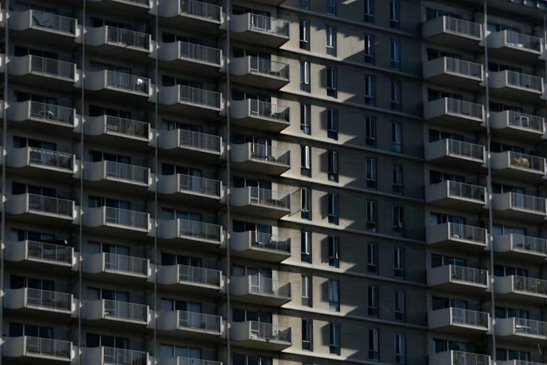 A tall apartment block.