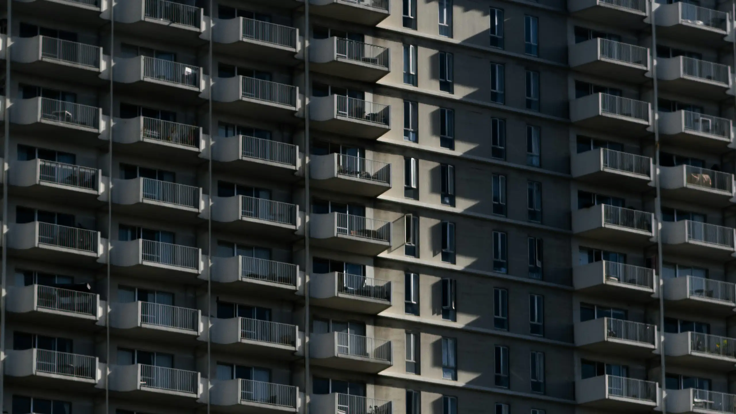 A tall apartment block.