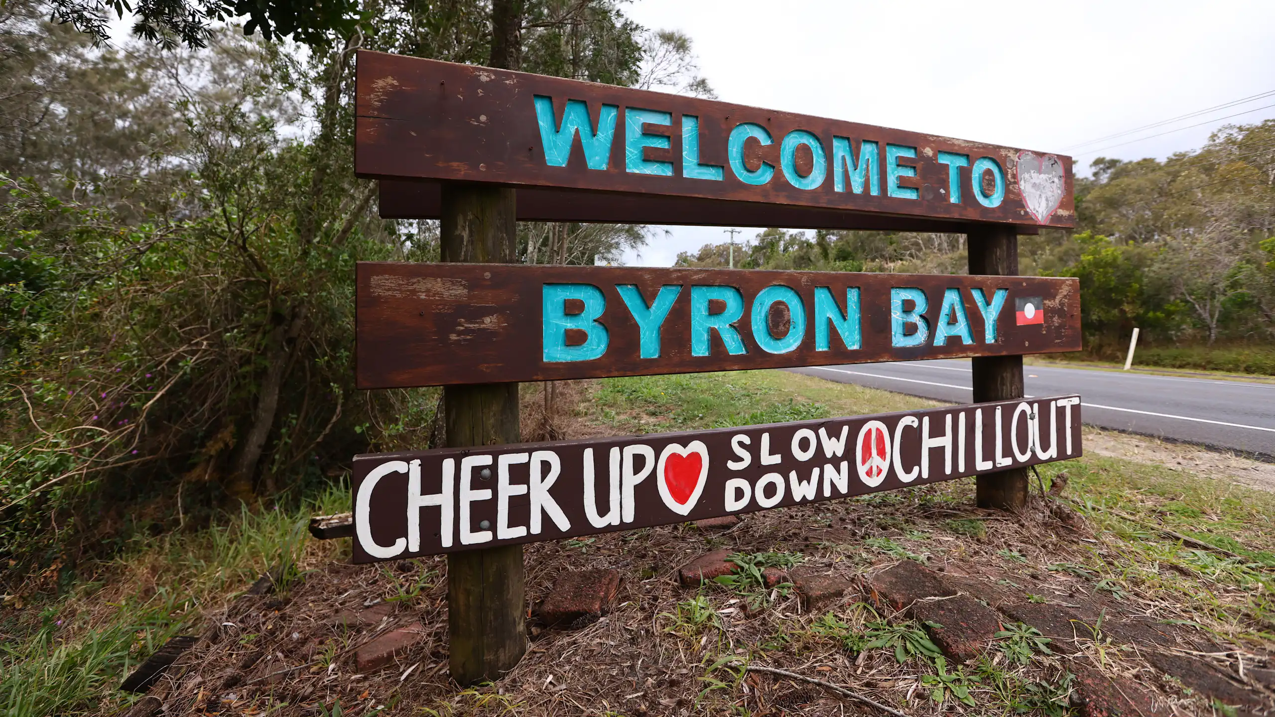 A sign that says welcome to Byron Bay