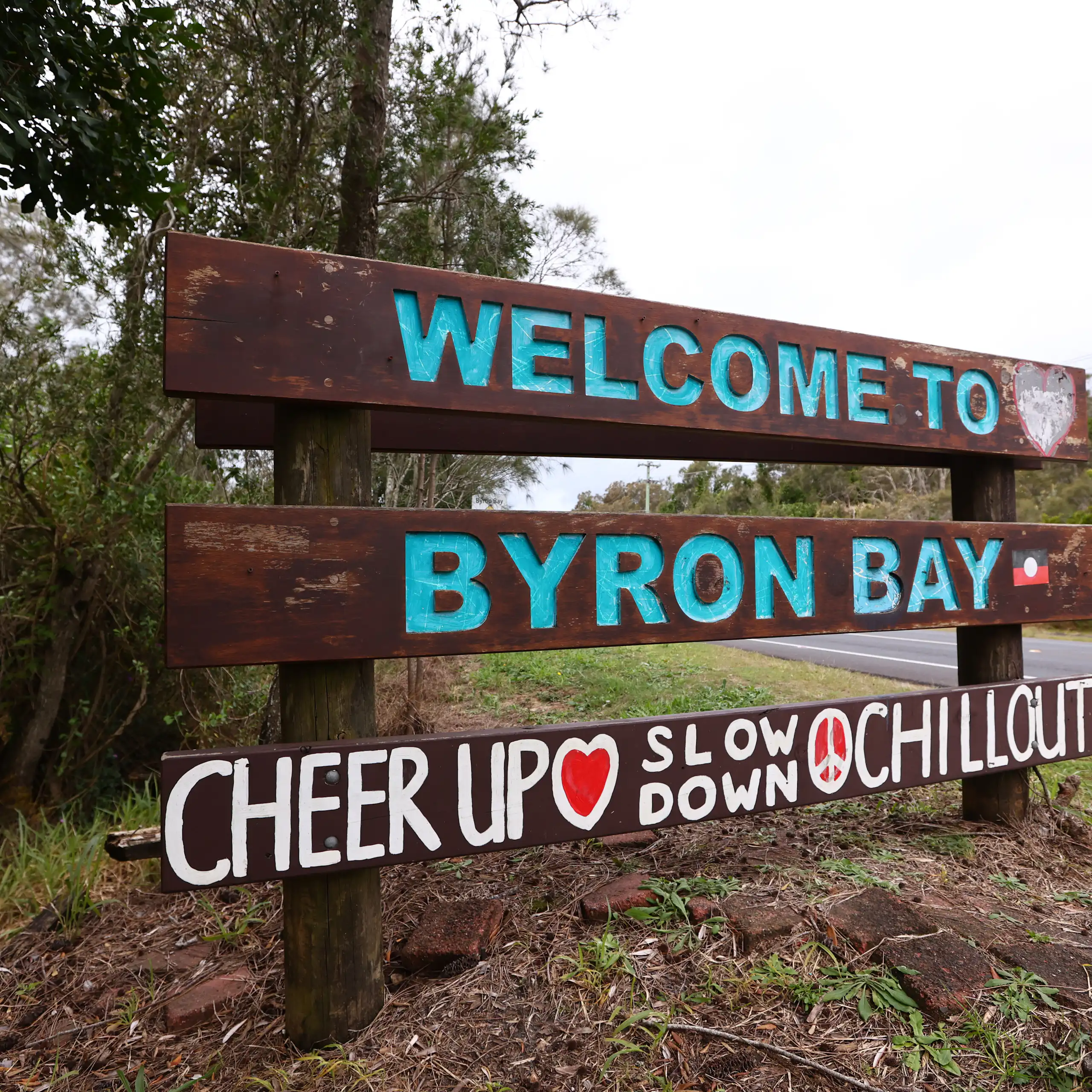 A sign that says welcome to Byron Bay