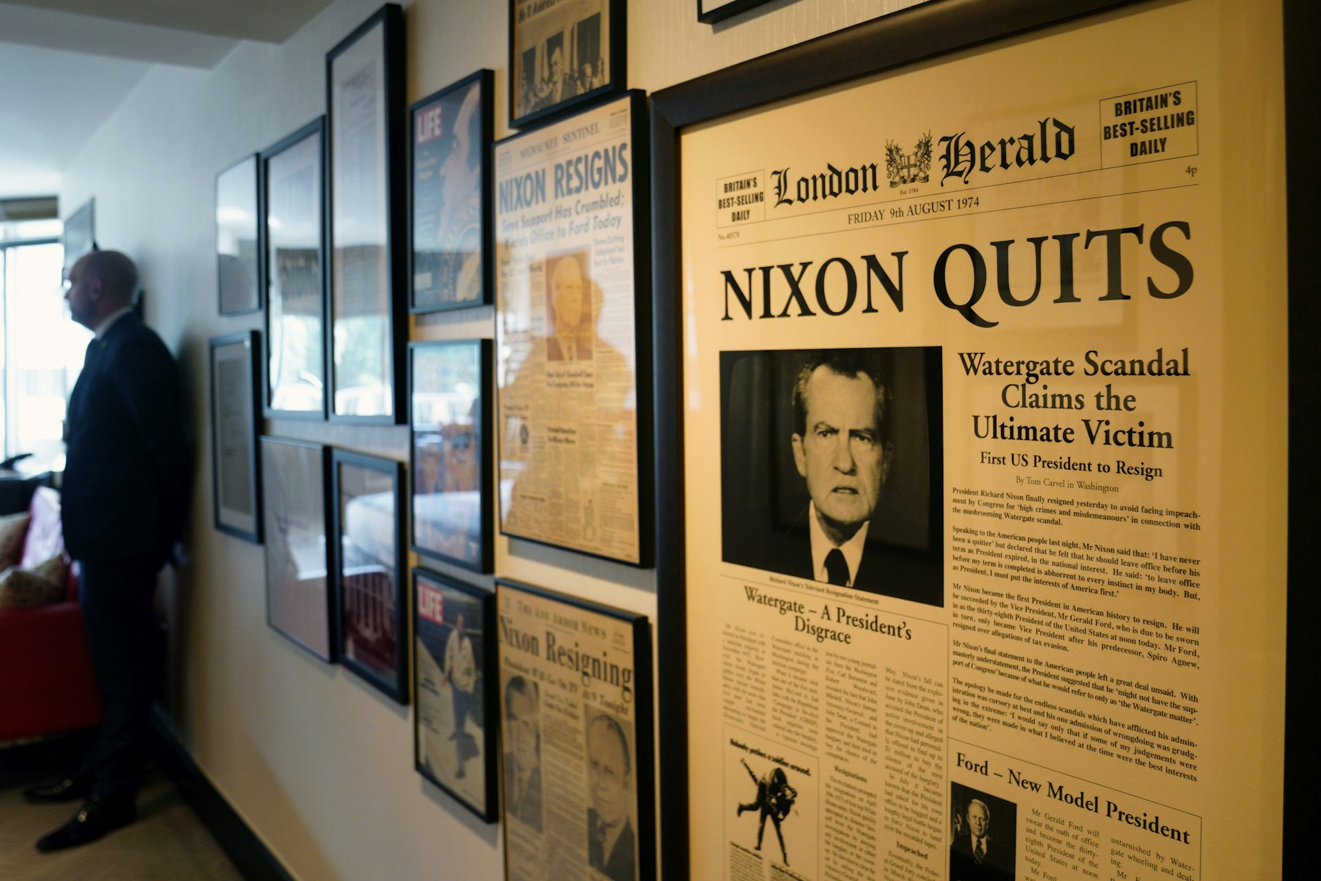 A story on the front page of a newspaper reporting Nixon's resignation following the Watergate scandal.