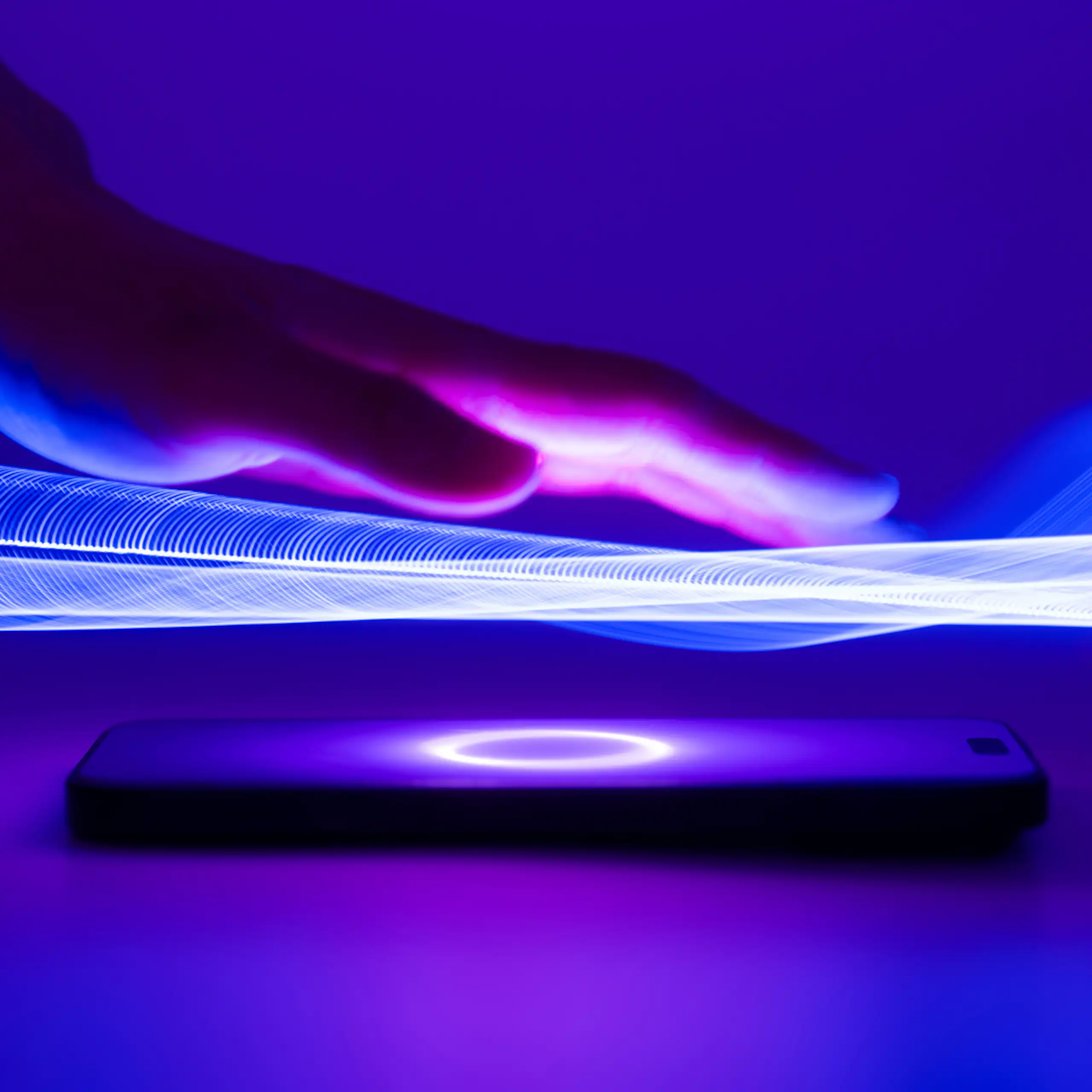 Digital illustration of a hand hovering over a glowing screen.