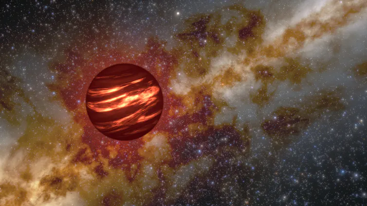 An illustration showing a brown dwarf as brown and red sphere floating in space