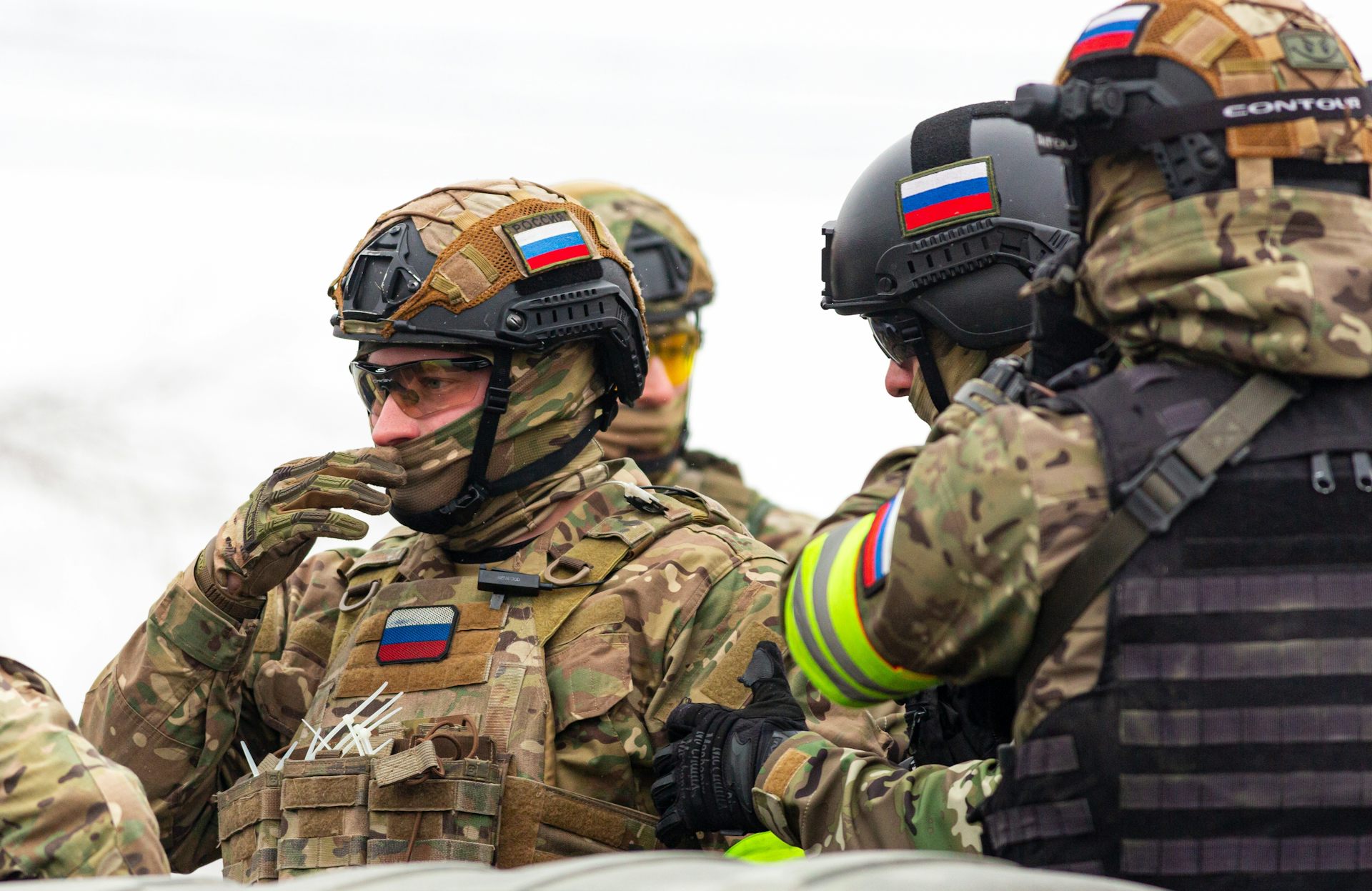 Russian Soldiers talking as they prepare for combat.