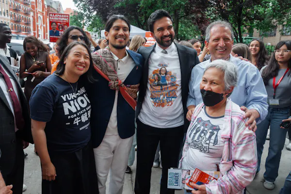 new york mayor zohran mamdani looking relaxed with supporters.