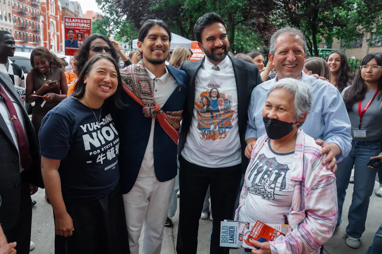 new york mayor zohran mamdani looking relaxed with supporters.
