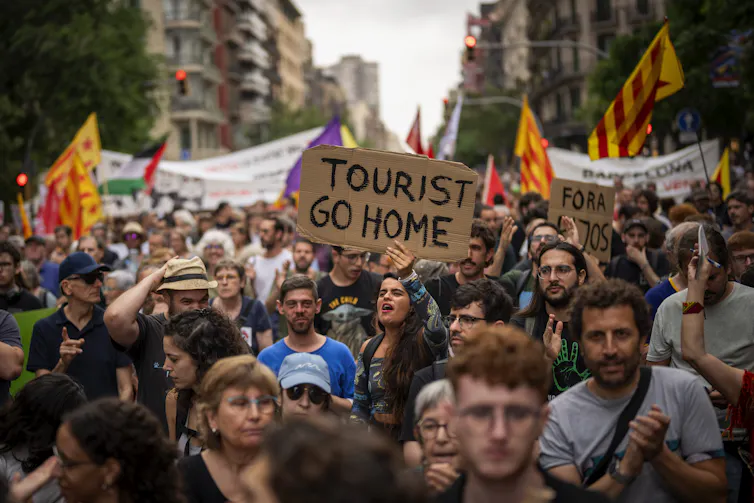 Around 500 Barcelona residents protest against mass tourism