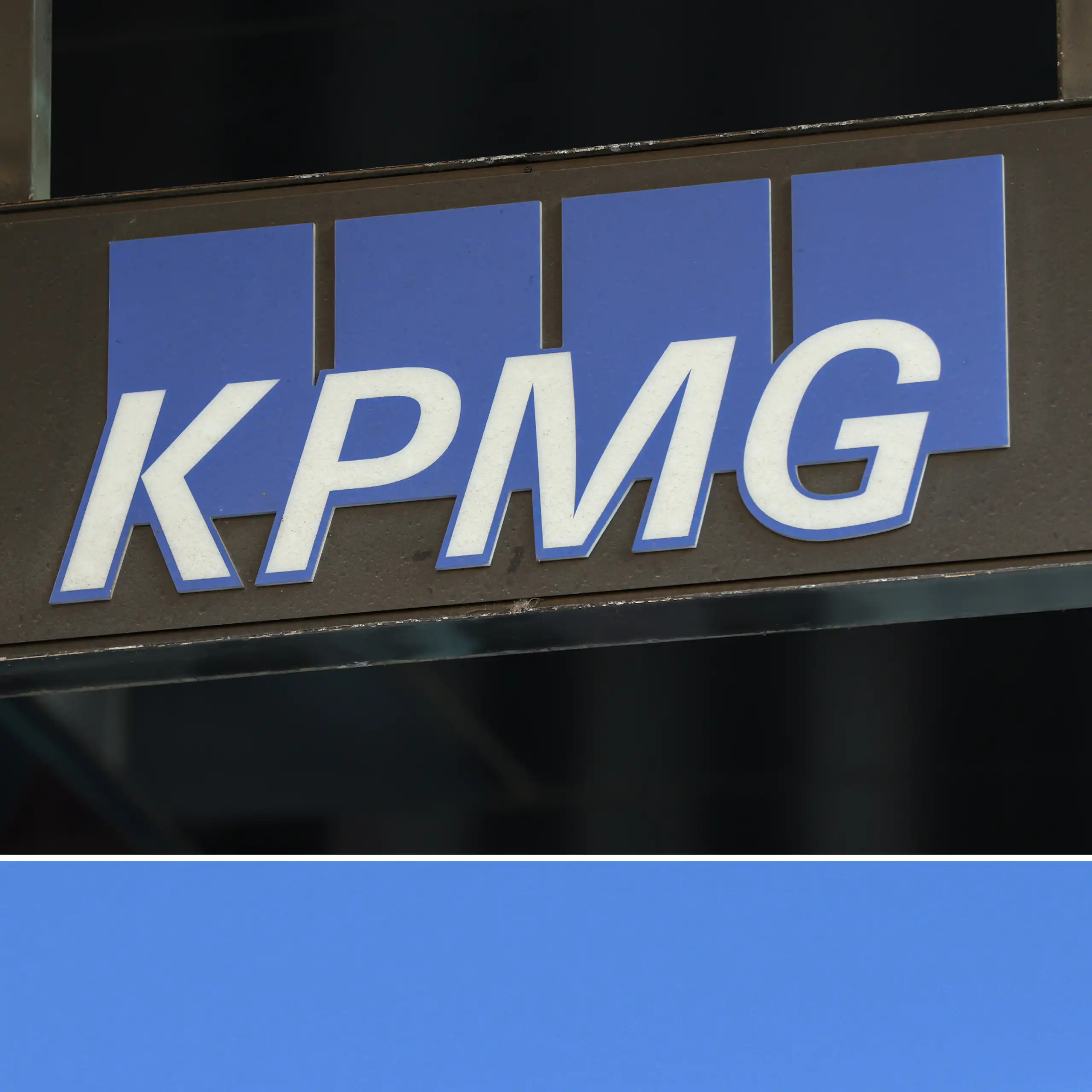 The four logos of PwC, KPMG, EY and Deloitte from the side of four buildings