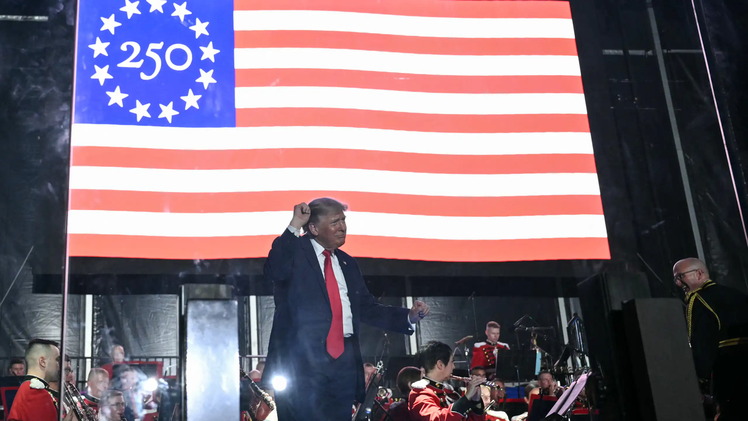 US President Donald Trump dances after speaking during the kick-off celebration for the "Great American State Fair" on the National Mall in Washington, DC, June 24, 2026. The "Great American State Fair" will be held from June 25 to July 10, 2026, to celebrate the 250th anniversary of US independence.