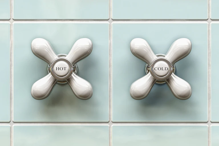 close up of hot and cold taps.