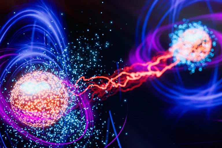 A graphic showing two particles connected by light