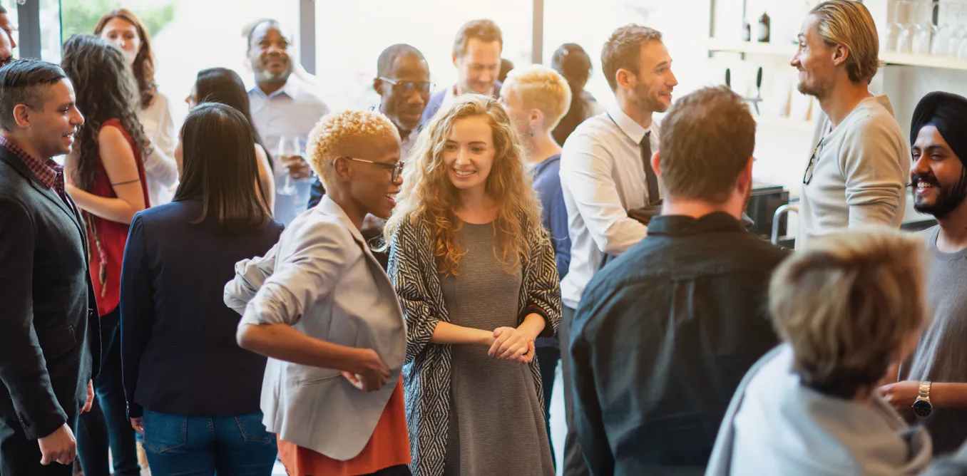 https://theconversation.com/small-talk-acts-like-social-glue-heres-how-to-get-better-at-it-286379 social preview image