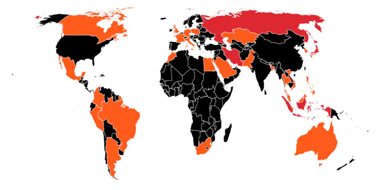 map of world, some countries in red, some orange, some black