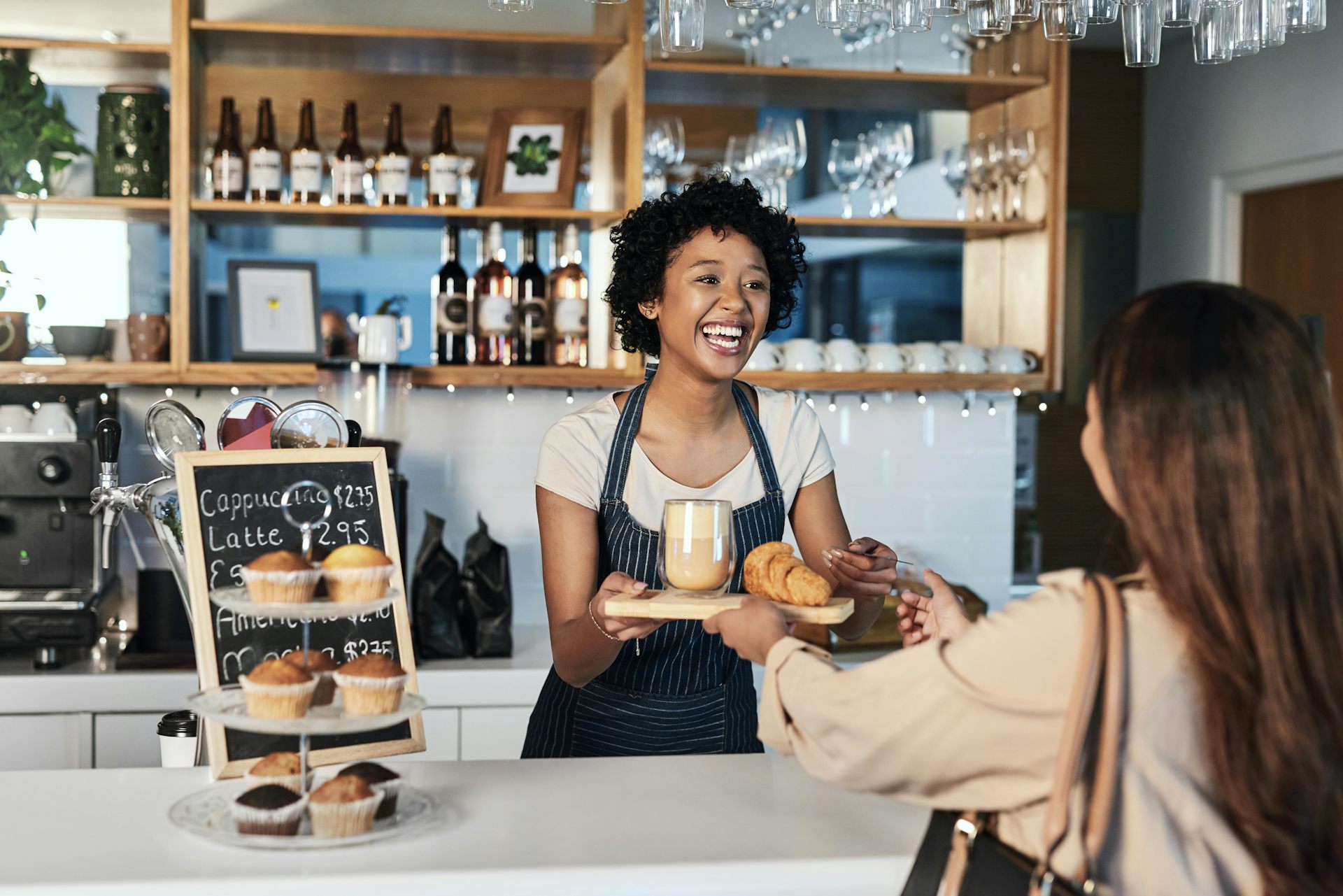 Barista and customer talking