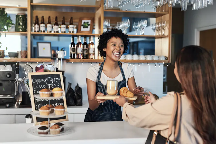 Barista and customer talking