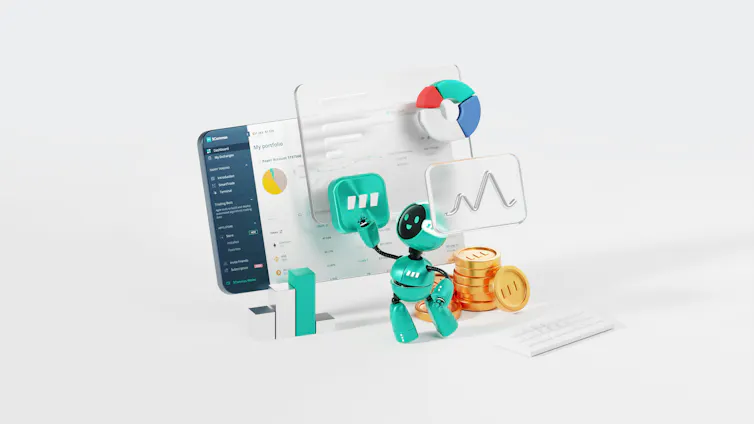 A photo image depicts a small green robot with coins at its side as it interacts with a computer.